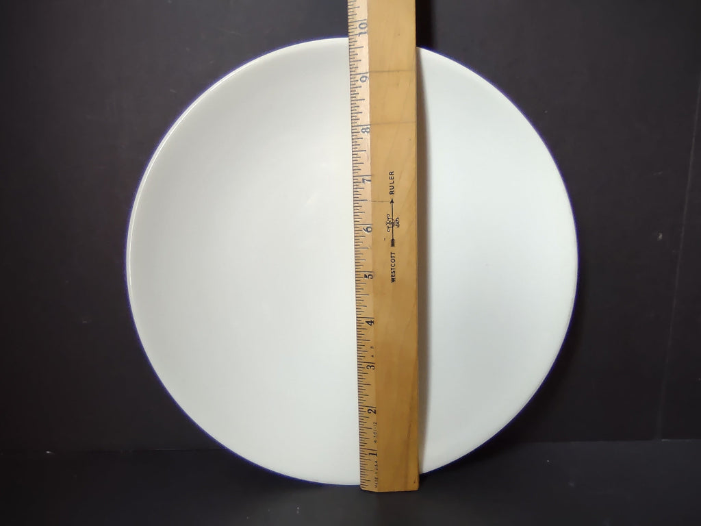 Vintage Peter Terris Original white coupe plate - ruler showing approximately 10" diameter