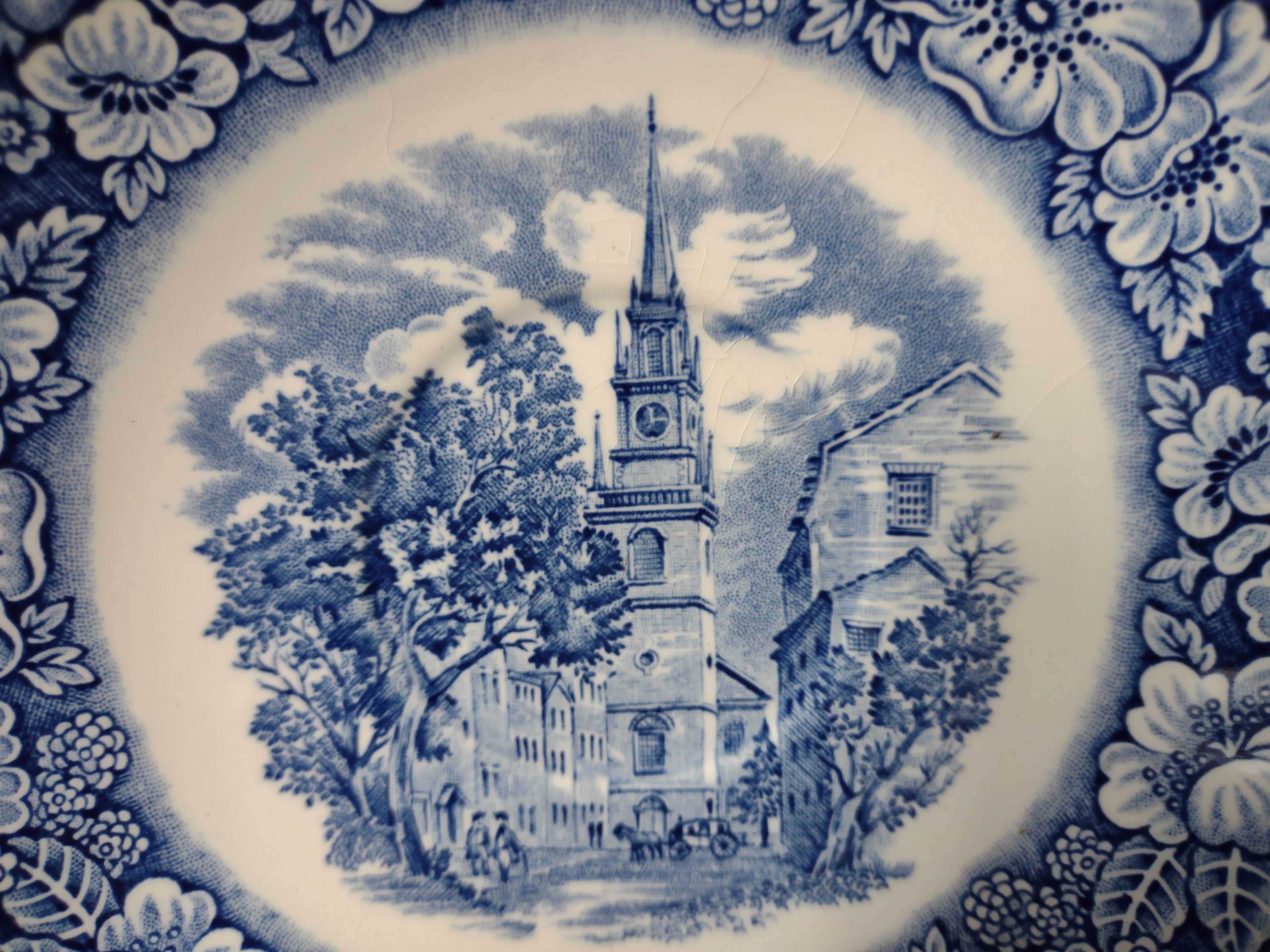 Vintage Liberty Blue Old North Church saucer - close-up of church steeple and floral border detail