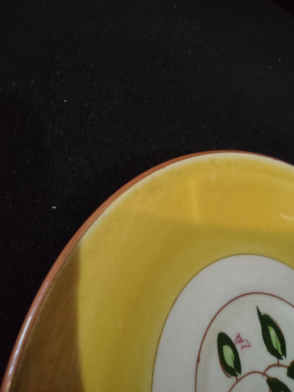 Vintage Stangl Pottery Blueberry Yellow Saucer - rim close-up showing yellow glaze and terra cotta edge