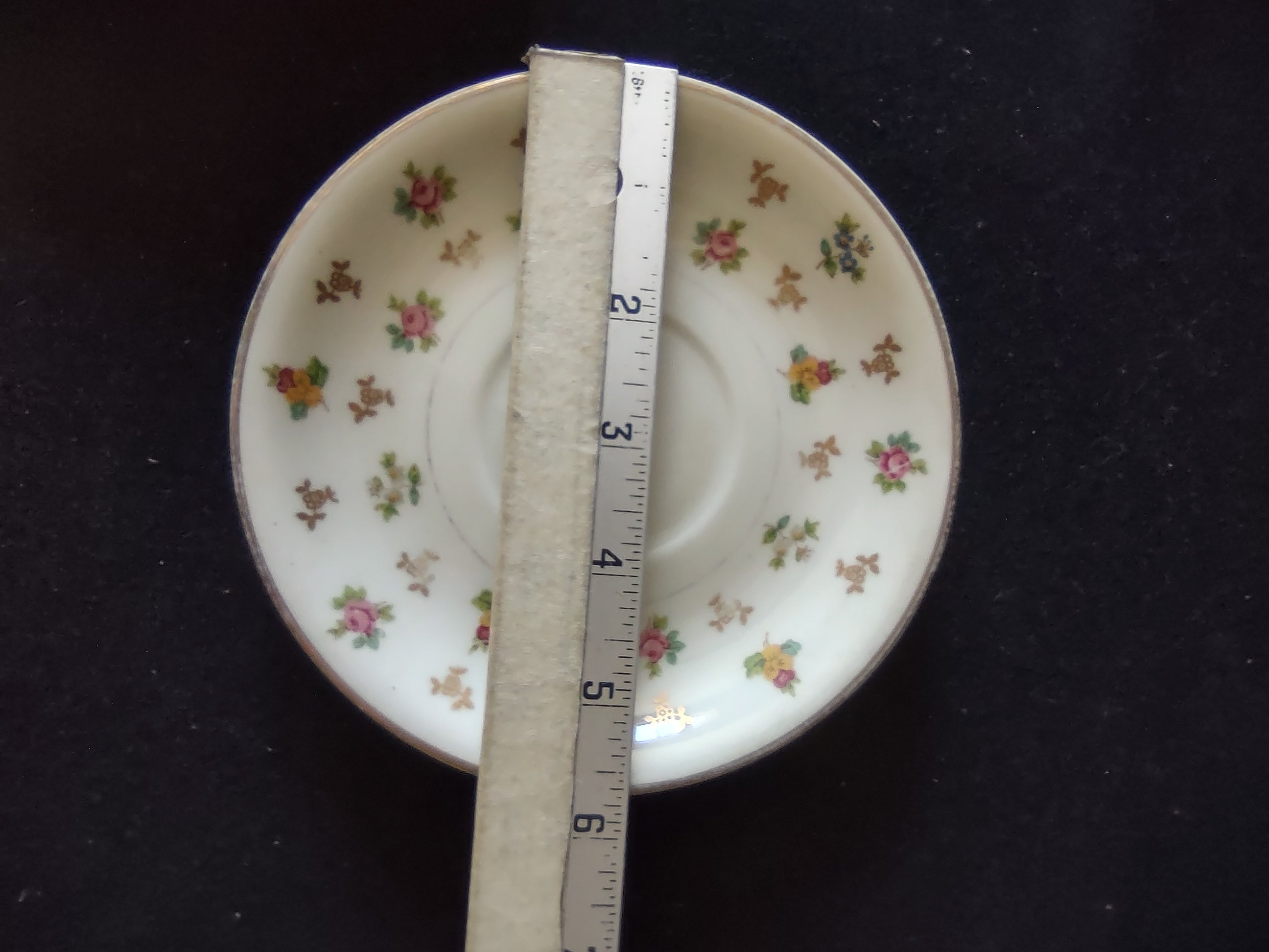Vintage Lamberton Ivory China Molly Pitcher Floral Saucer [6905] - close-up of pattern detail showing pink roses, blue forget-me-nots, yellow pansies and gold foliate sprays with gold rim