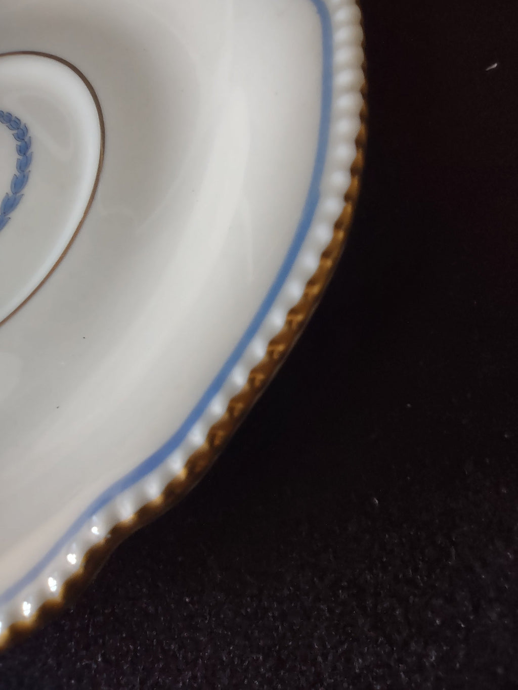 Castleton China Empire saucer front view blue laurel wreath motif gold rim