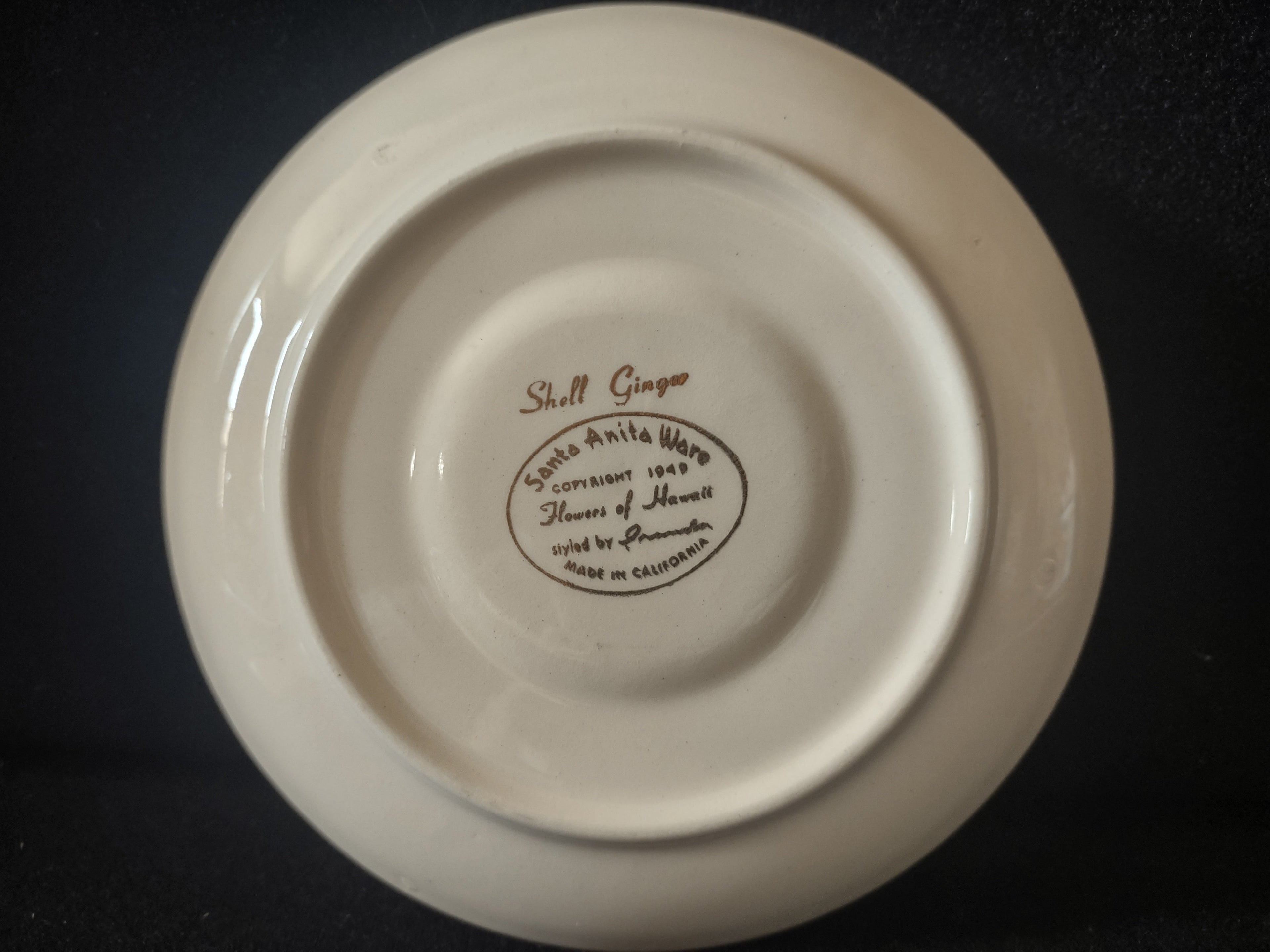 Santa Anita Ware Shell Ginger saucer backstamp showing Flowers of Hawaii copyright 1949 styled by Irameda Made in California
