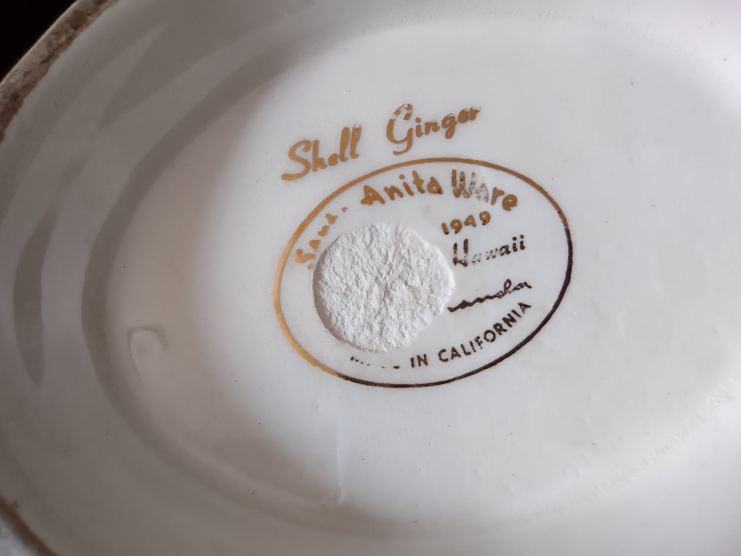 Santa Anita Ware Shell Ginger teapot lid interior showing discoloration on foot ring