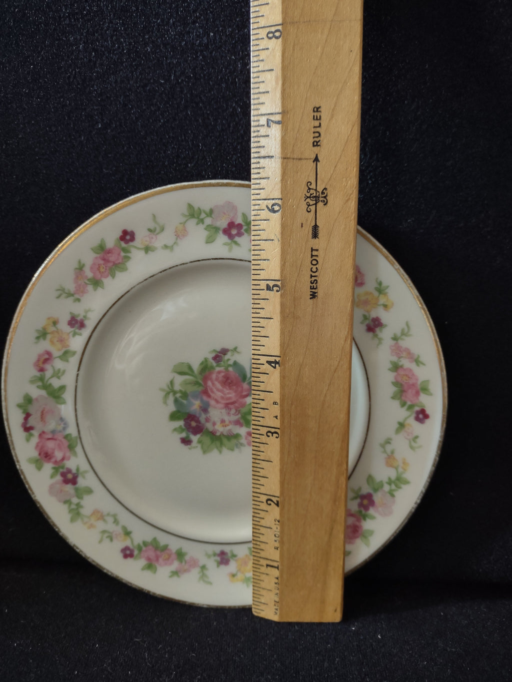 Vintage Lamberton China Dolly Madison plate size reference with ruler showing approximately 7 inches