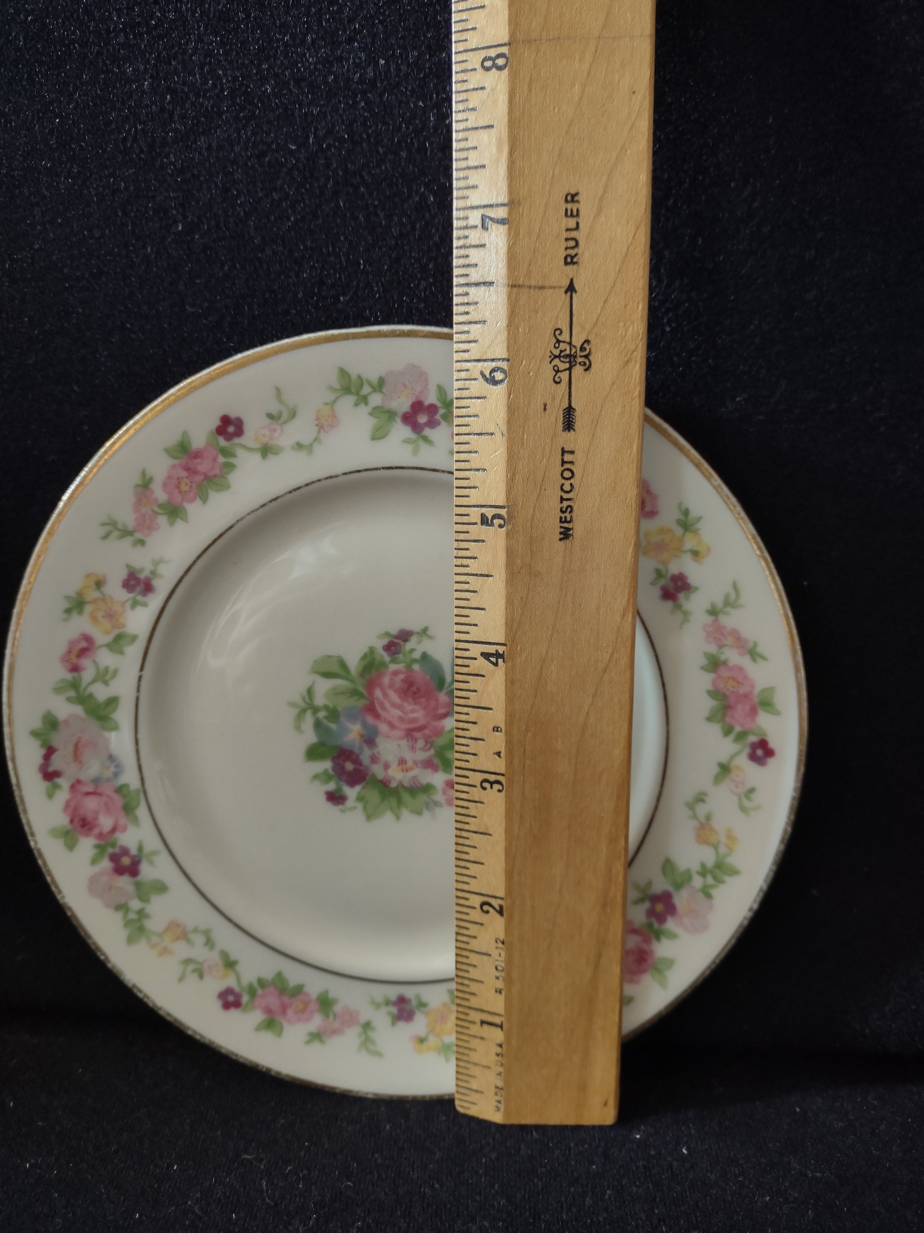 Vintage Lamberton China Dolly Madison plate size reference with ruler showing approximately 7 inches