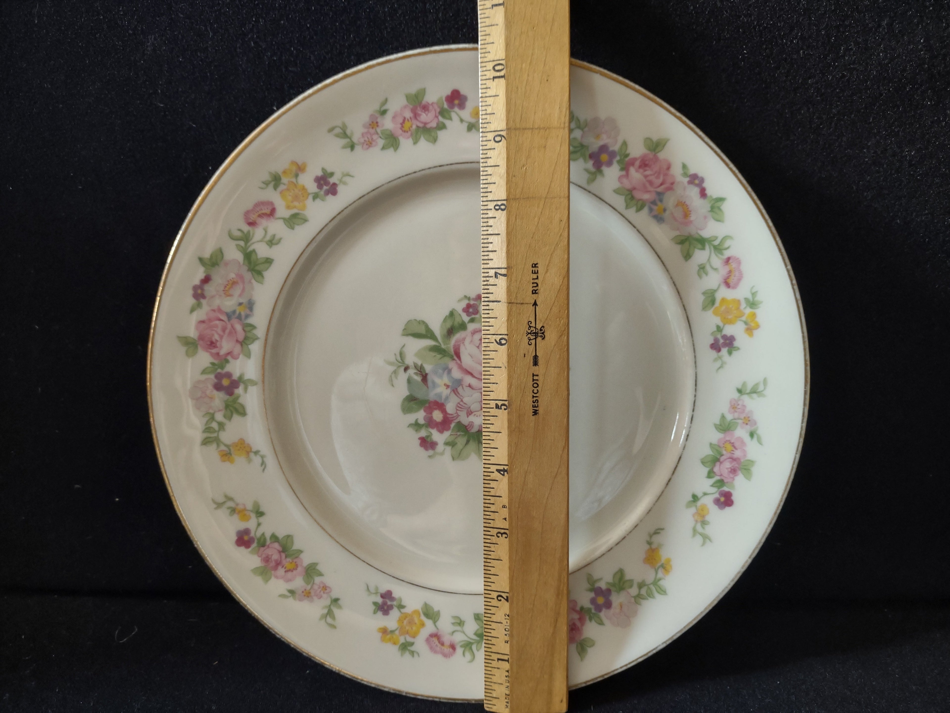 Vintage Lamberton China Dolly Madison round plate, front view showing pink roses, yellow flowers, purple violets, and gold trim border