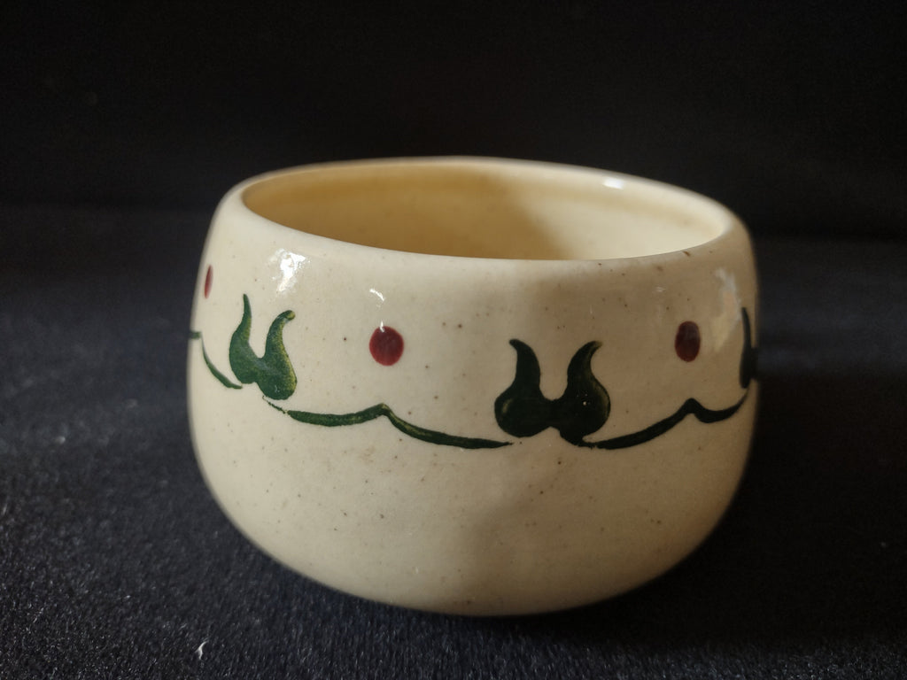 Metlox Poppytrail saucer with ruler showing approx 6 inch diameter