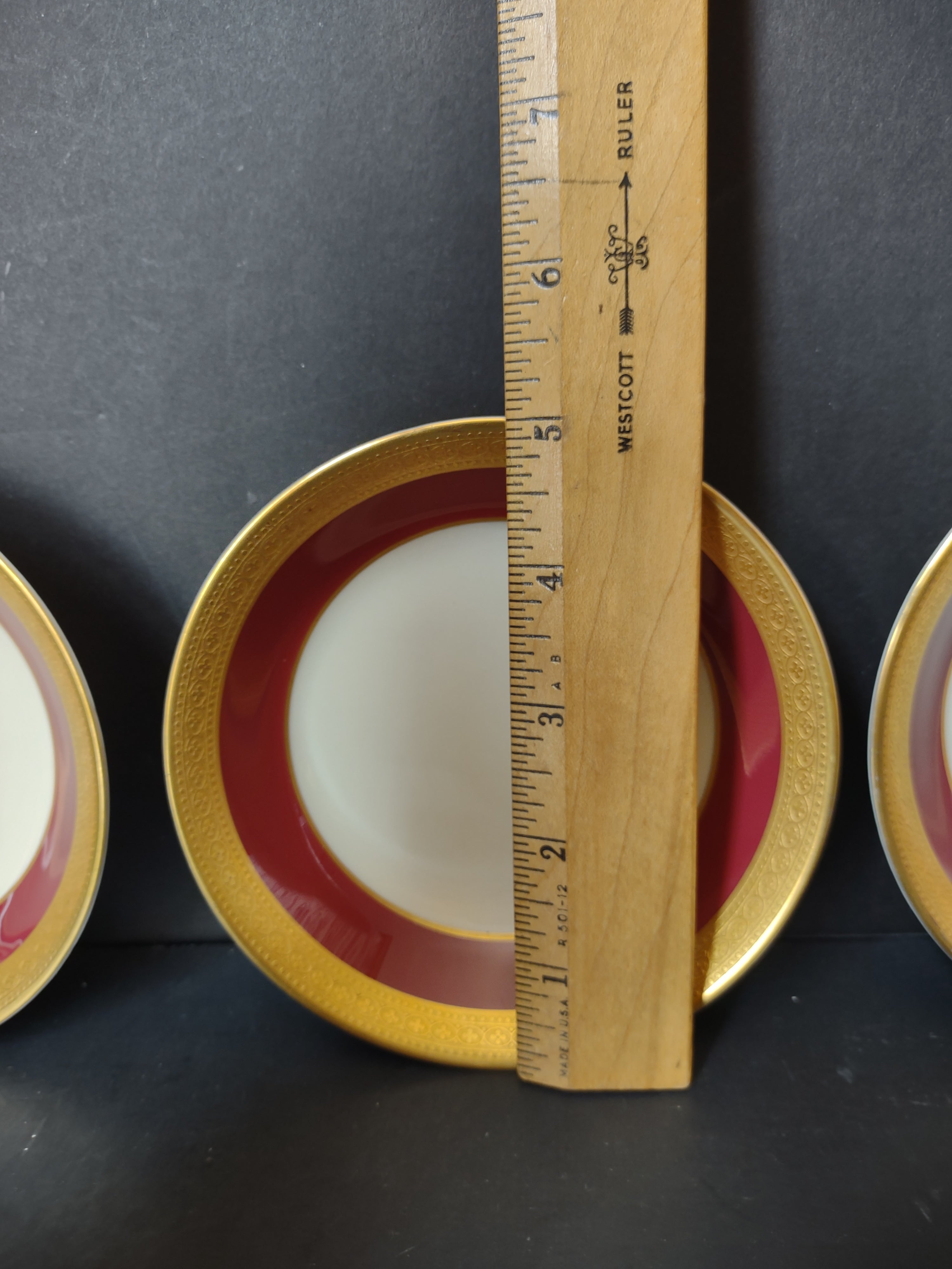 Vintage Syracuse China crimson red and gold filigree plates set of 3 and bowl front view