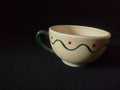 Vintage Metlox Poppytrail Navajo cup, cream body with green wavy line and red dots, green handle