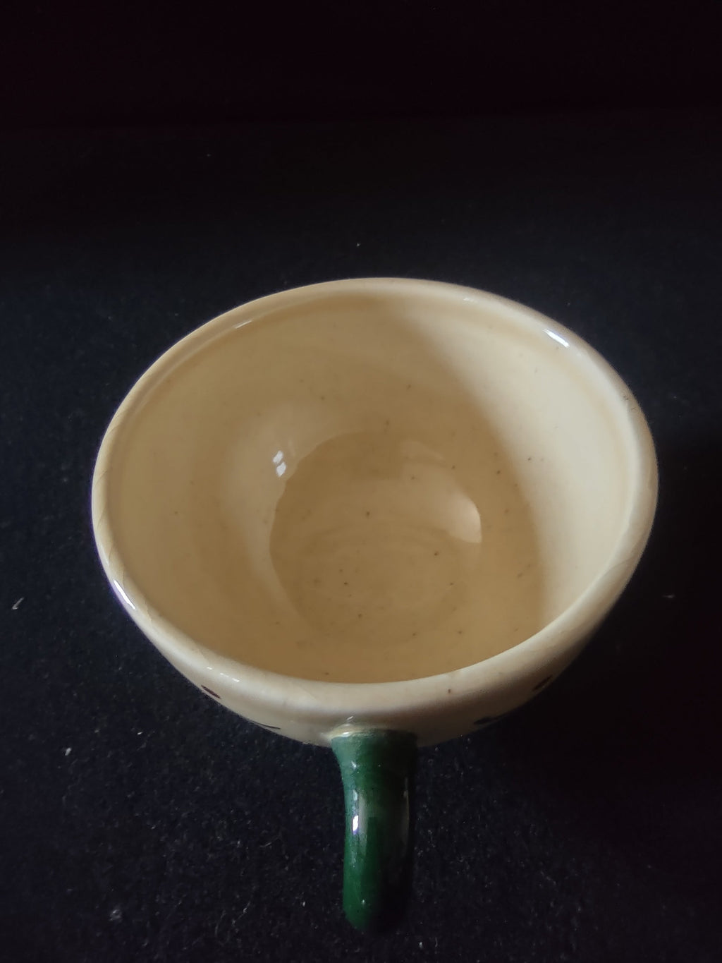 Interior view of Metlox Poppytrail Navajo cup showing age discoloration