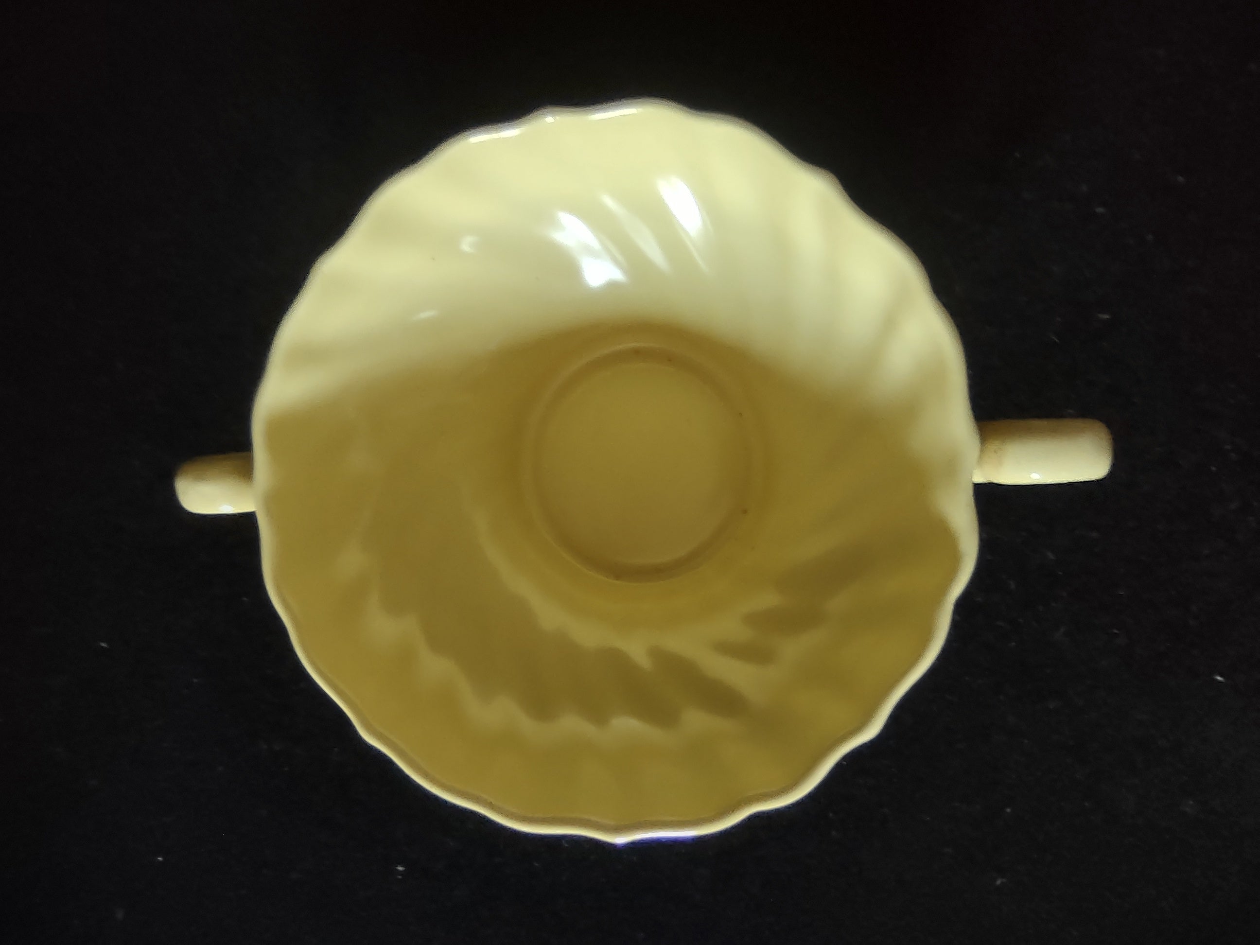 Base of Franciscan Ware Swirl yellow cream soup bowl showing Made in USA stamp
