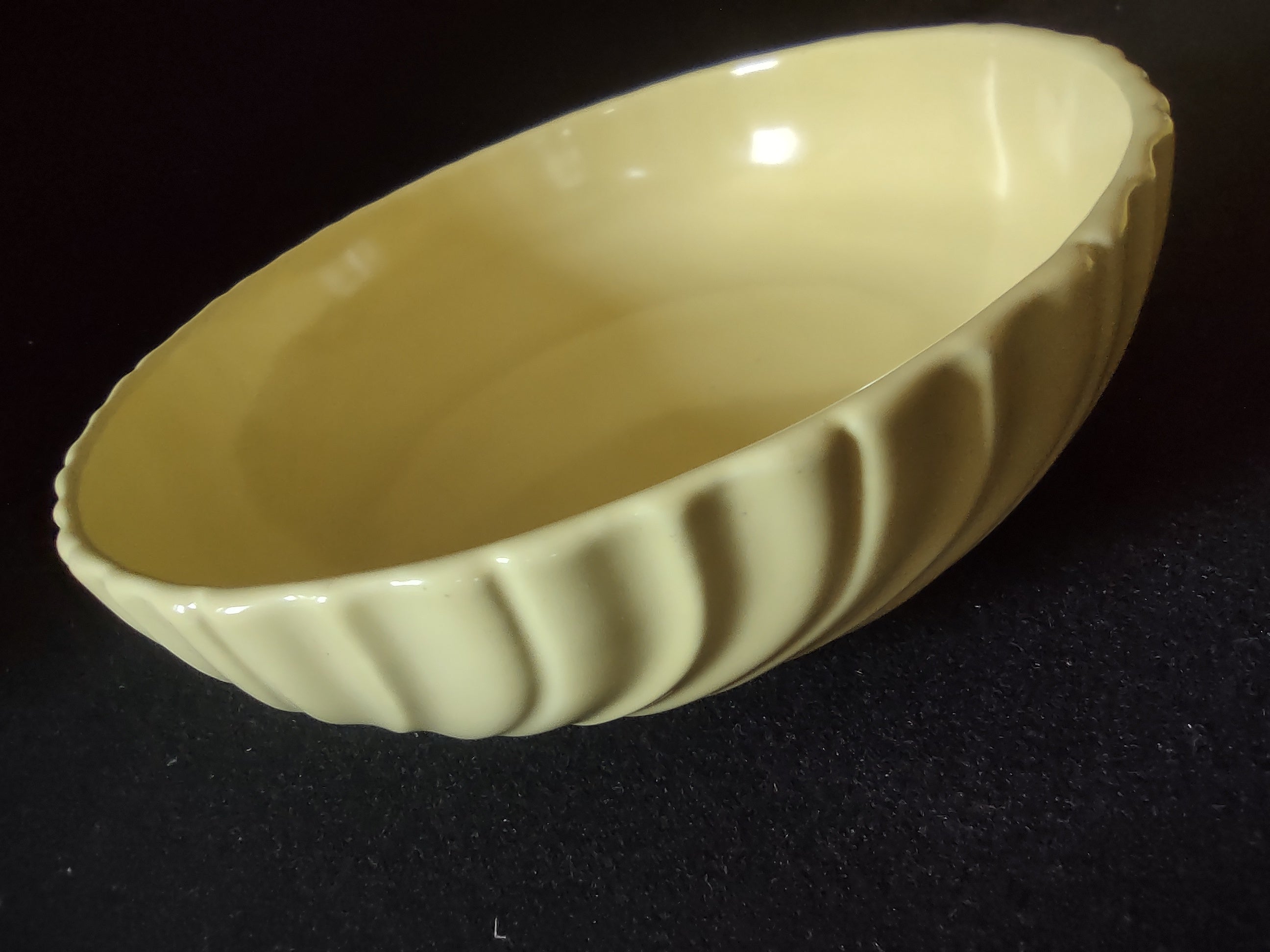 Vintage Franciscan Ware Swirl Cream Bowl - angled view showing swirl ribbing