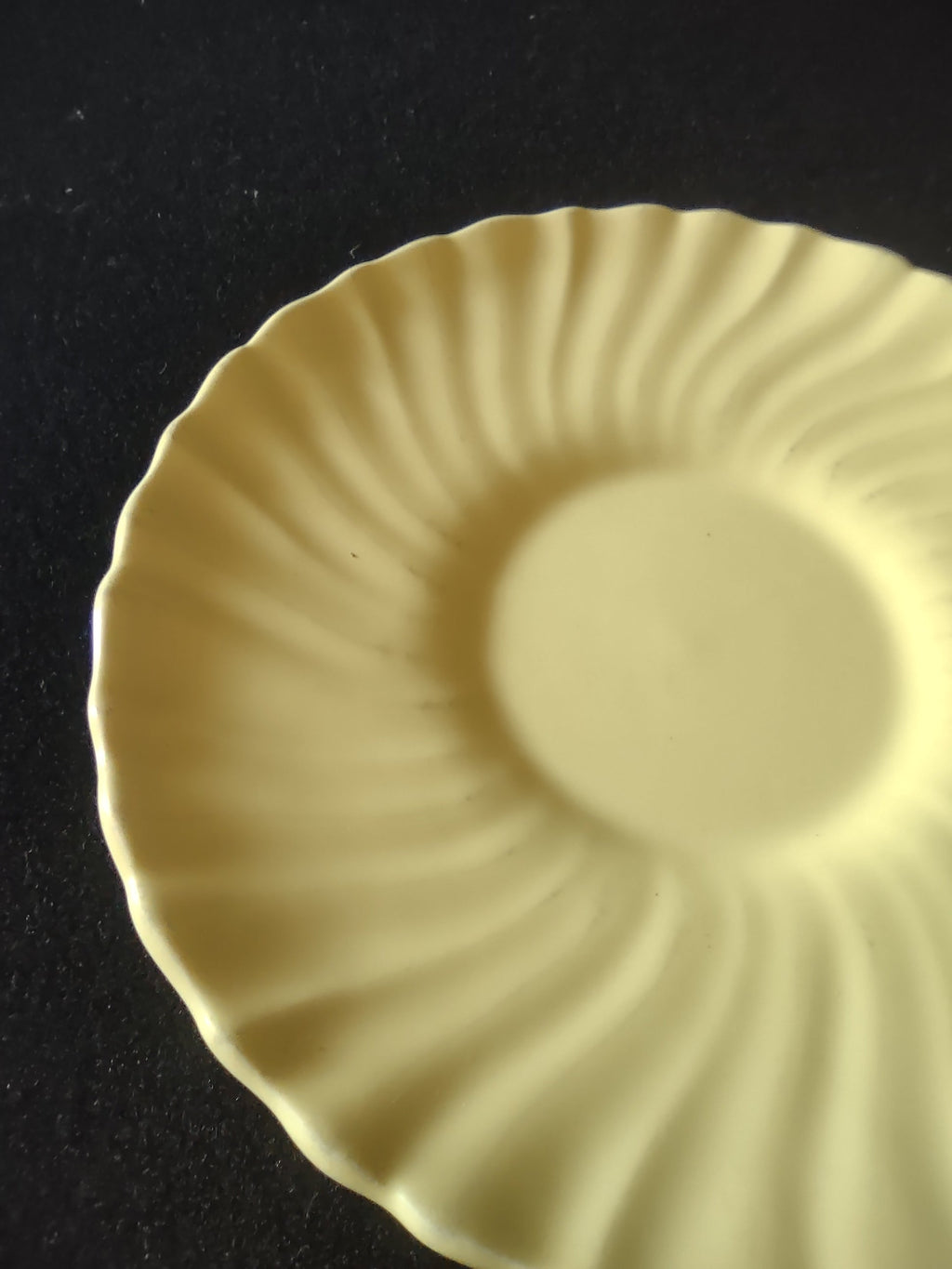 Vintage Franciscan Ware Swirl Cream Saucer - close-up of swirl ribbing and scalloped rim