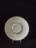 Full top view of saucer on display stand