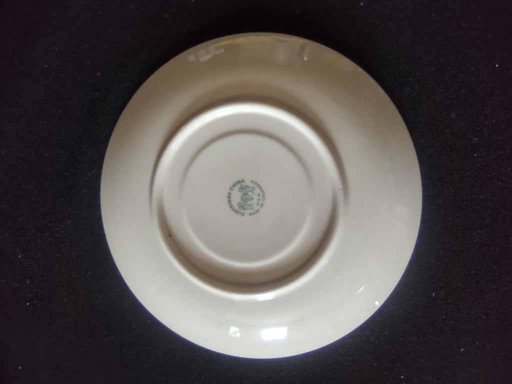Flintridge China saucer rim detail showing platinum band scratches
