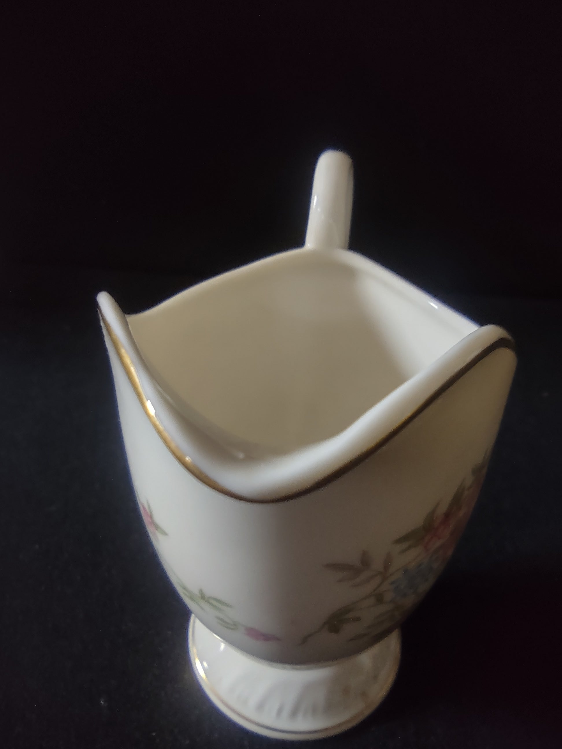 Vintage footed creamer base detail - discoloration on foot rim