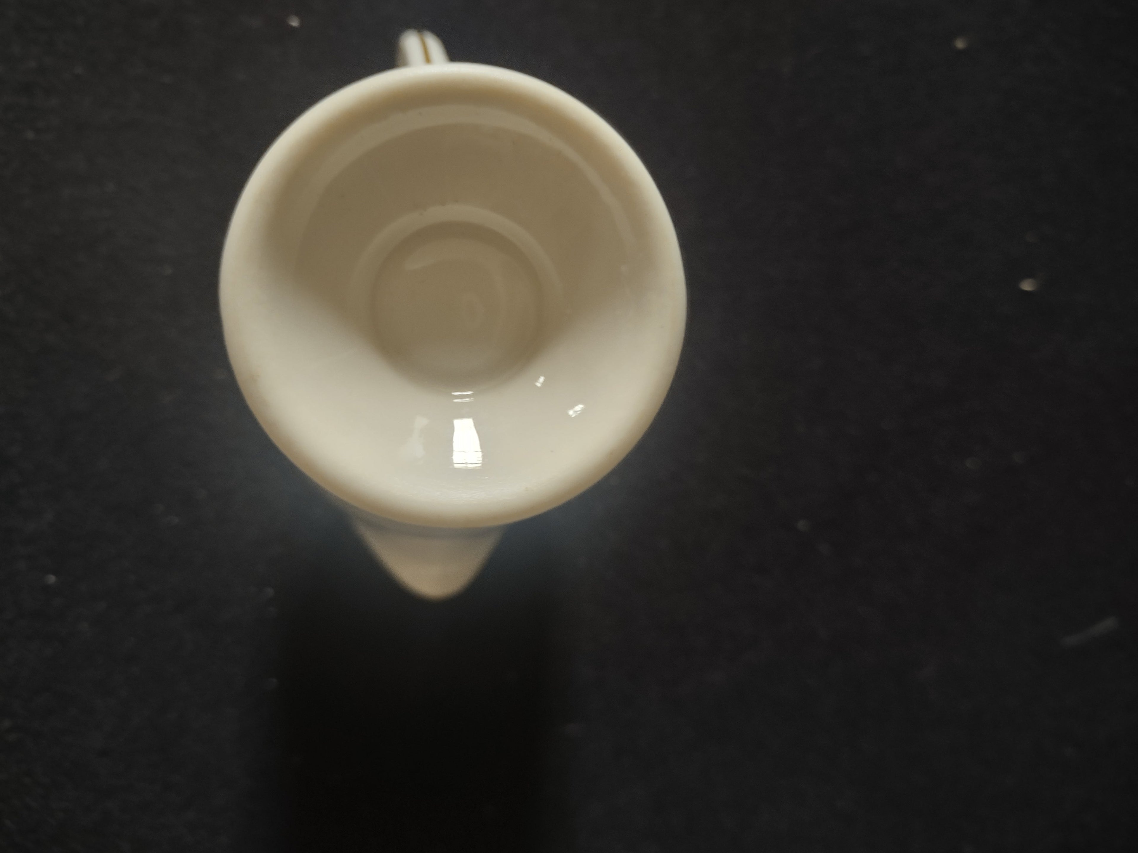 Vintage footed creamer reverse side view