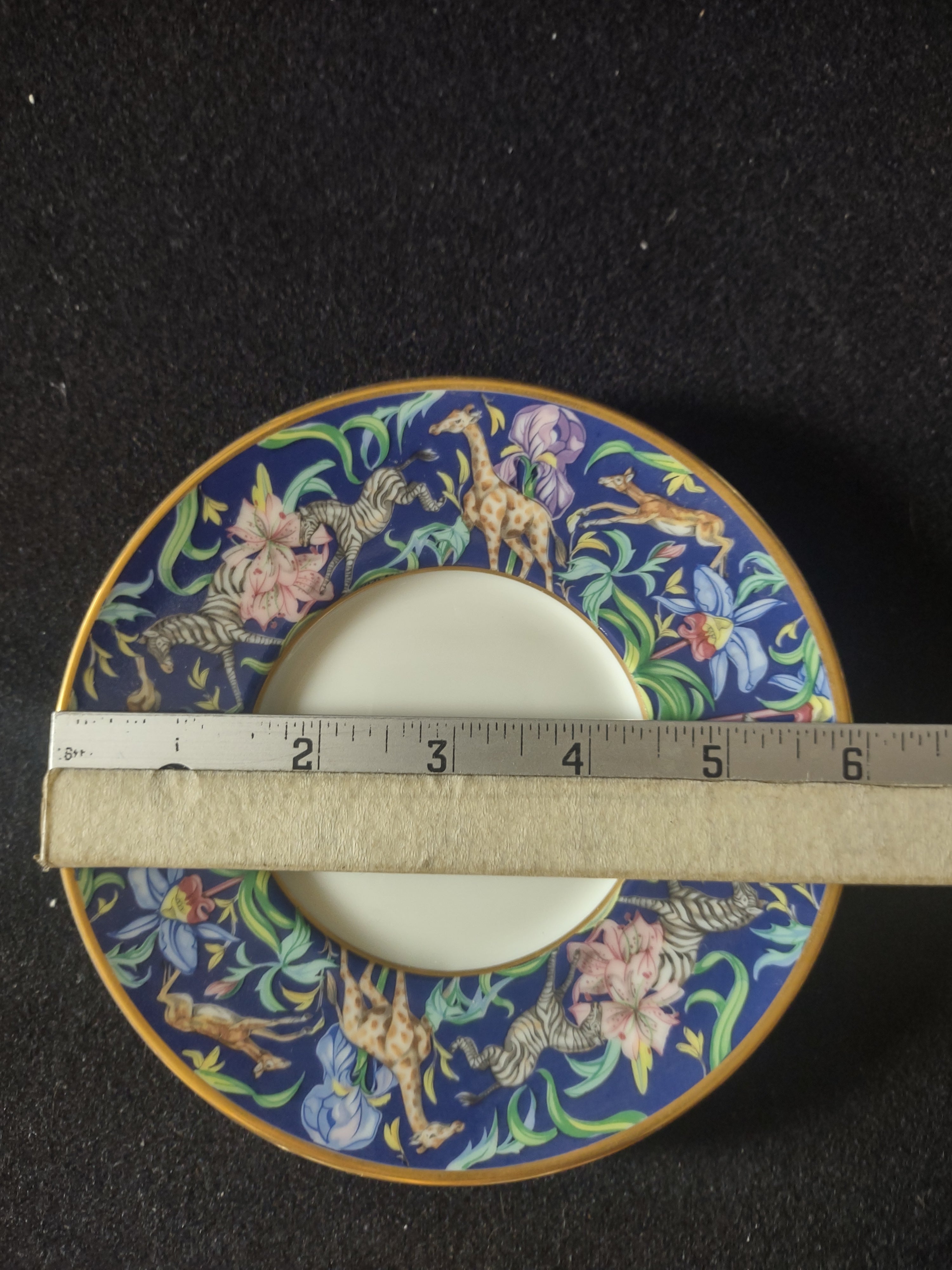 Franciscan Safari saucer with ruler showing 6 inch diameter