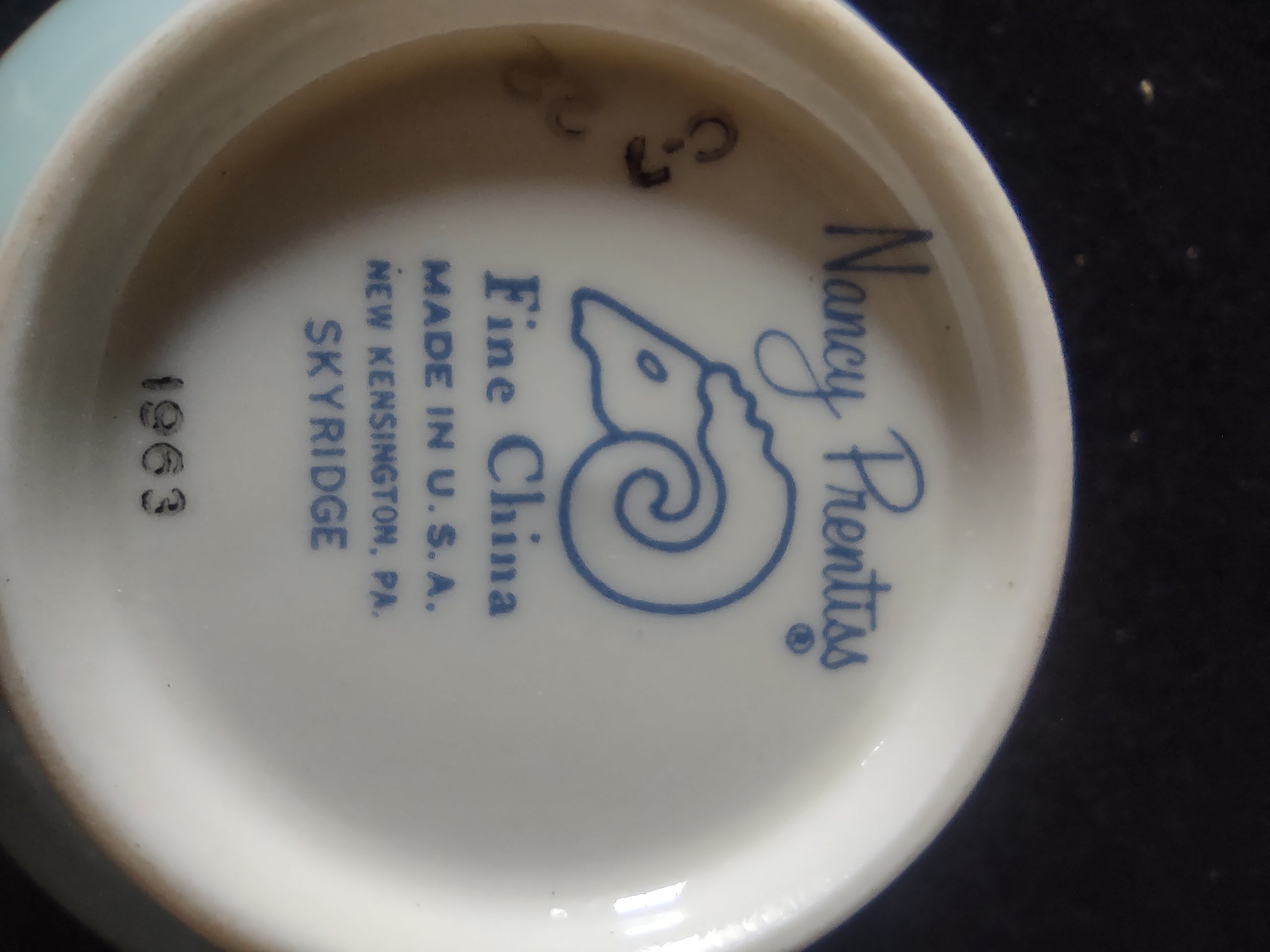 Nancy Prentiss Skyridge cup with ruler for scale