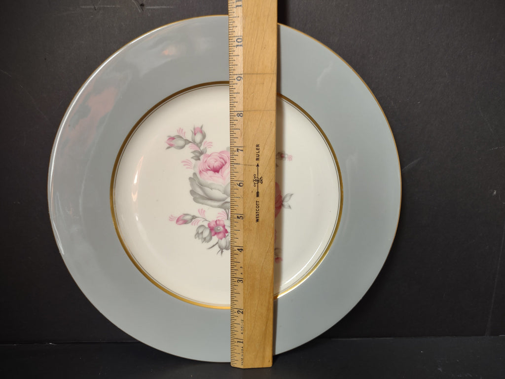 Front view of Castleton China Rosemere plate showing pink rose bouquet on off-white center with dove-grey rim and gold band