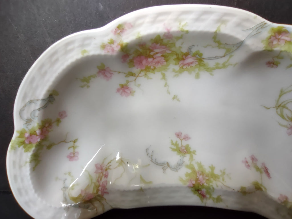 Haviland Limoges crescent bone dish with ruler showing 6 inch length