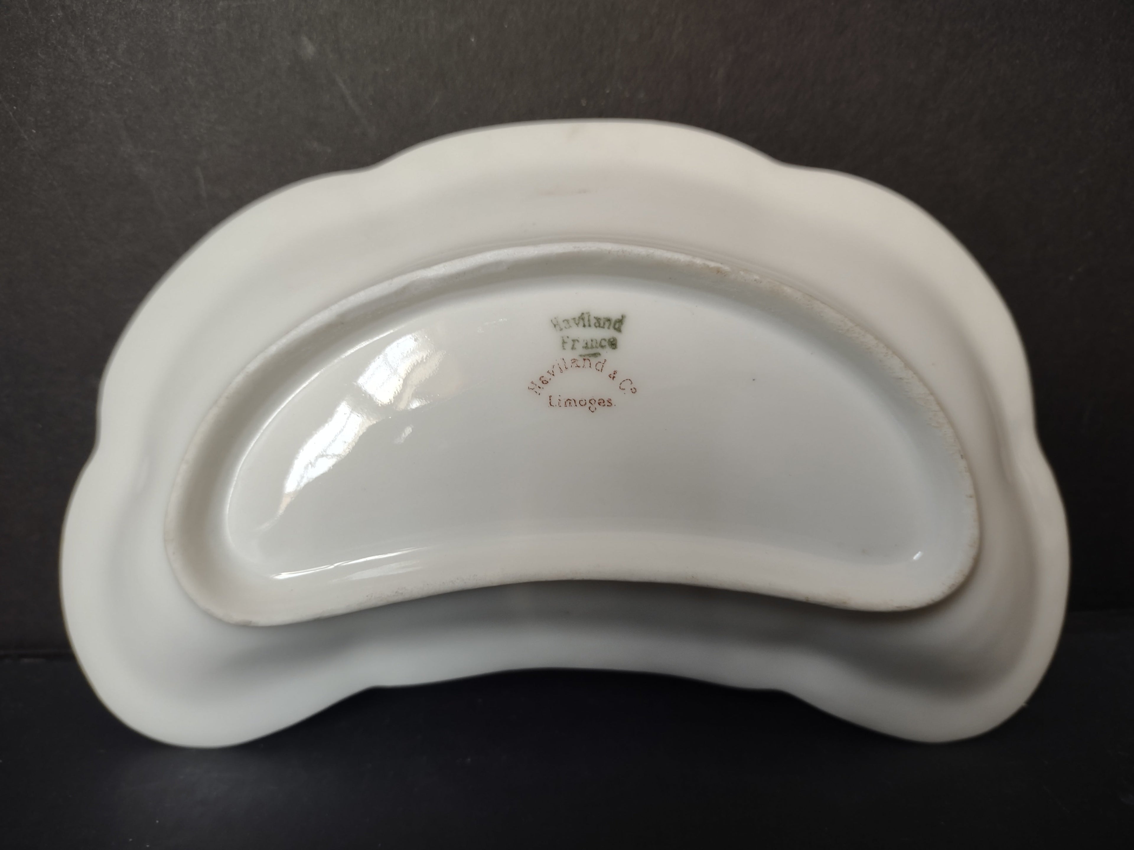 Haviland Limoges bone dish side view with ruler showing height
