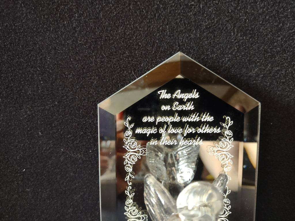 Vintage glass angel figurine with ruler showing approximately 6 inch height