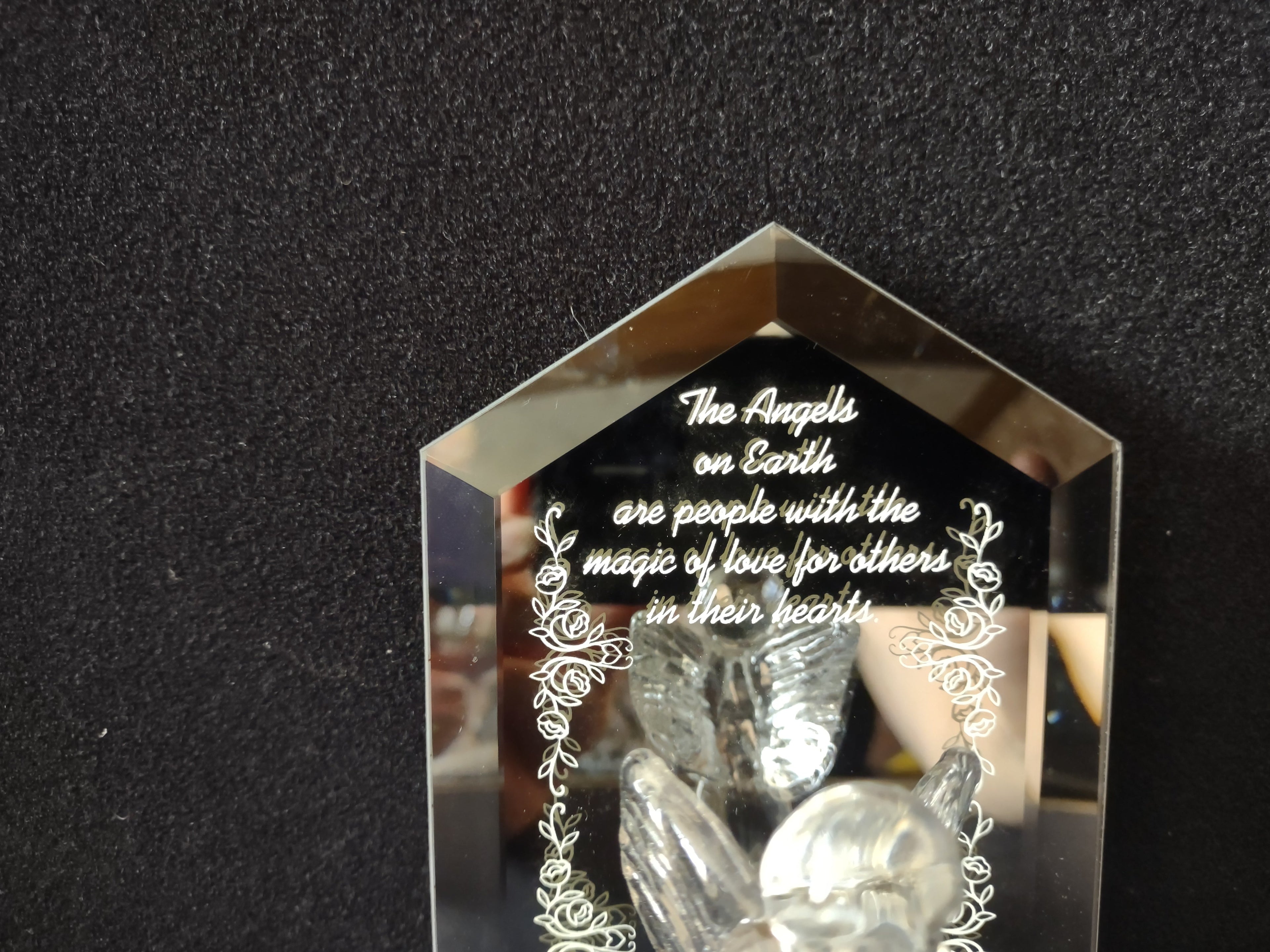 Vintage glass angel figurine with ruler showing approximately 6 inch height