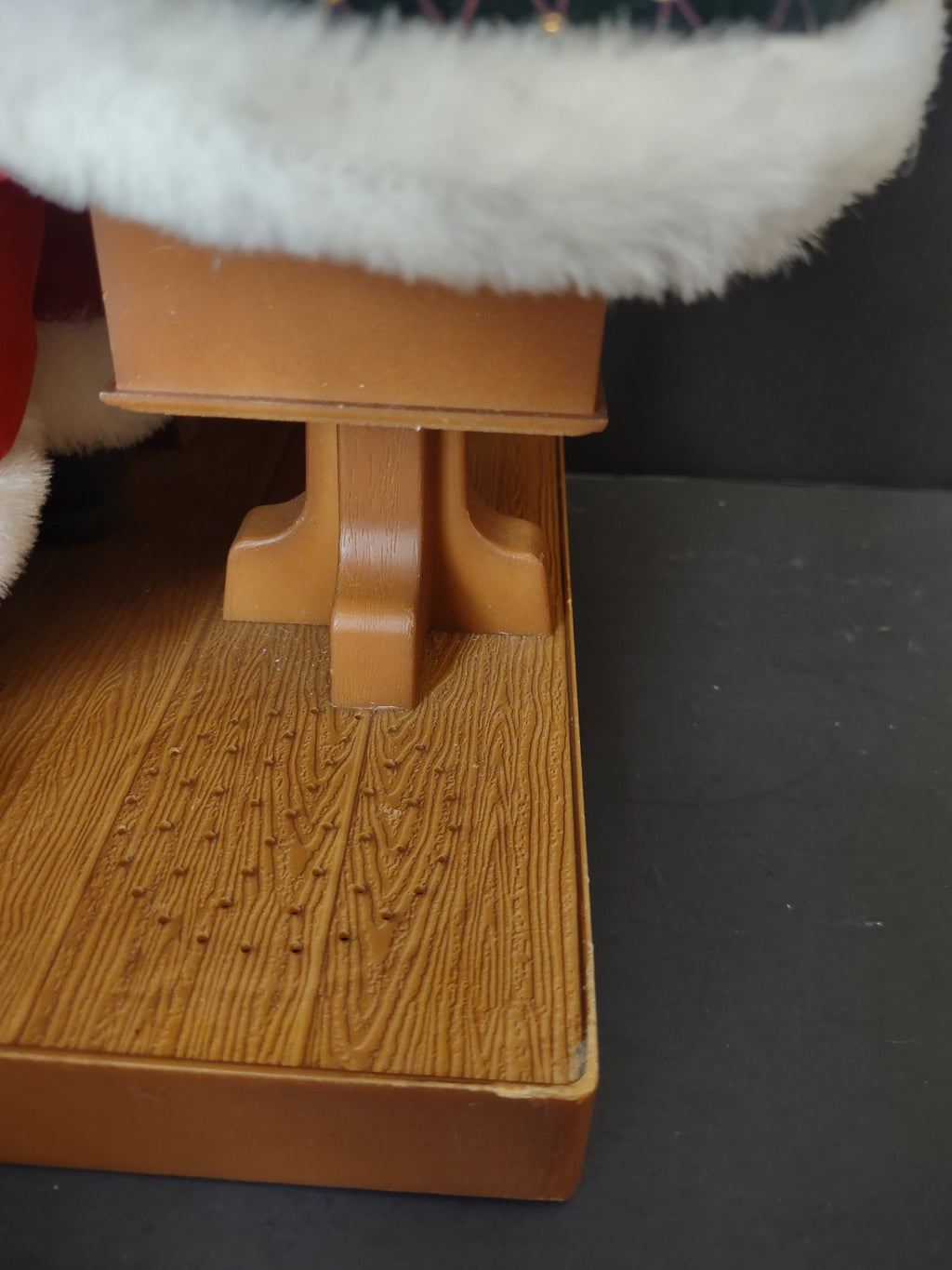 Vintage animated Santa Claus at school desk - three-quarter front view