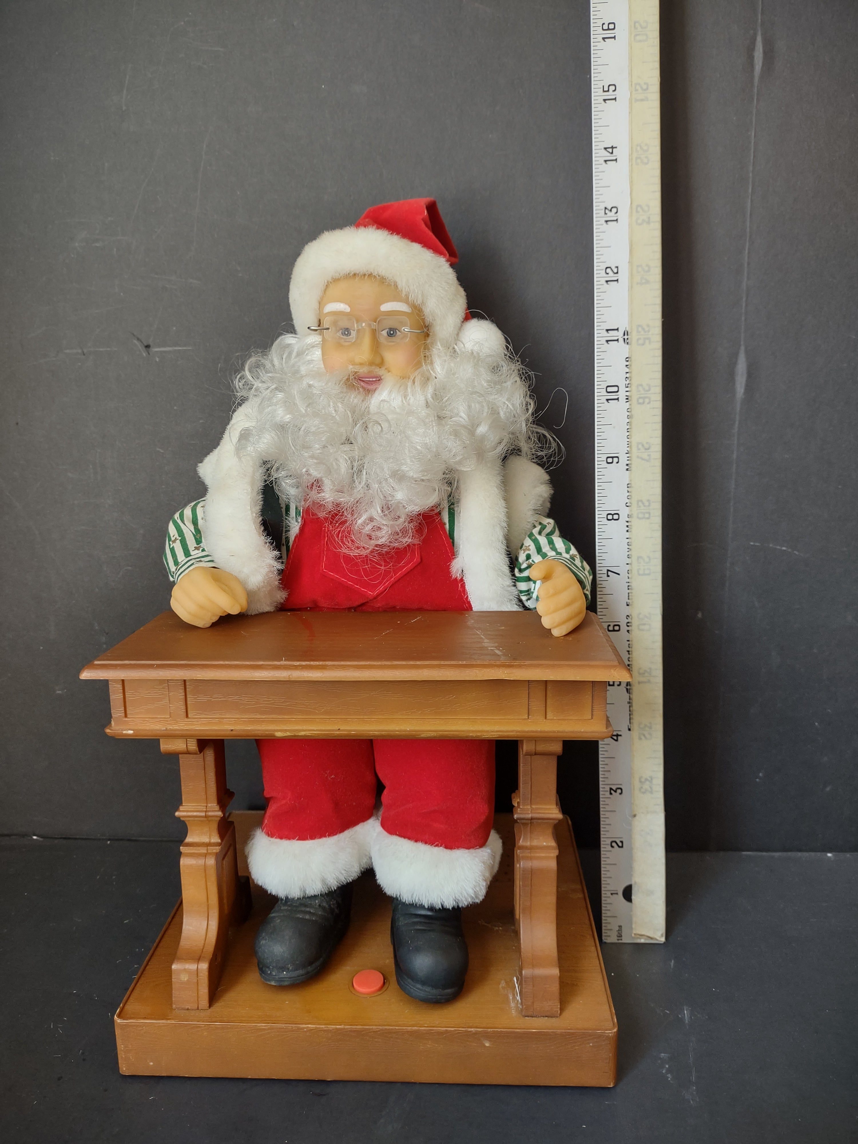 Vintage animated Santa Claus at school desk - additional angle showing full figure