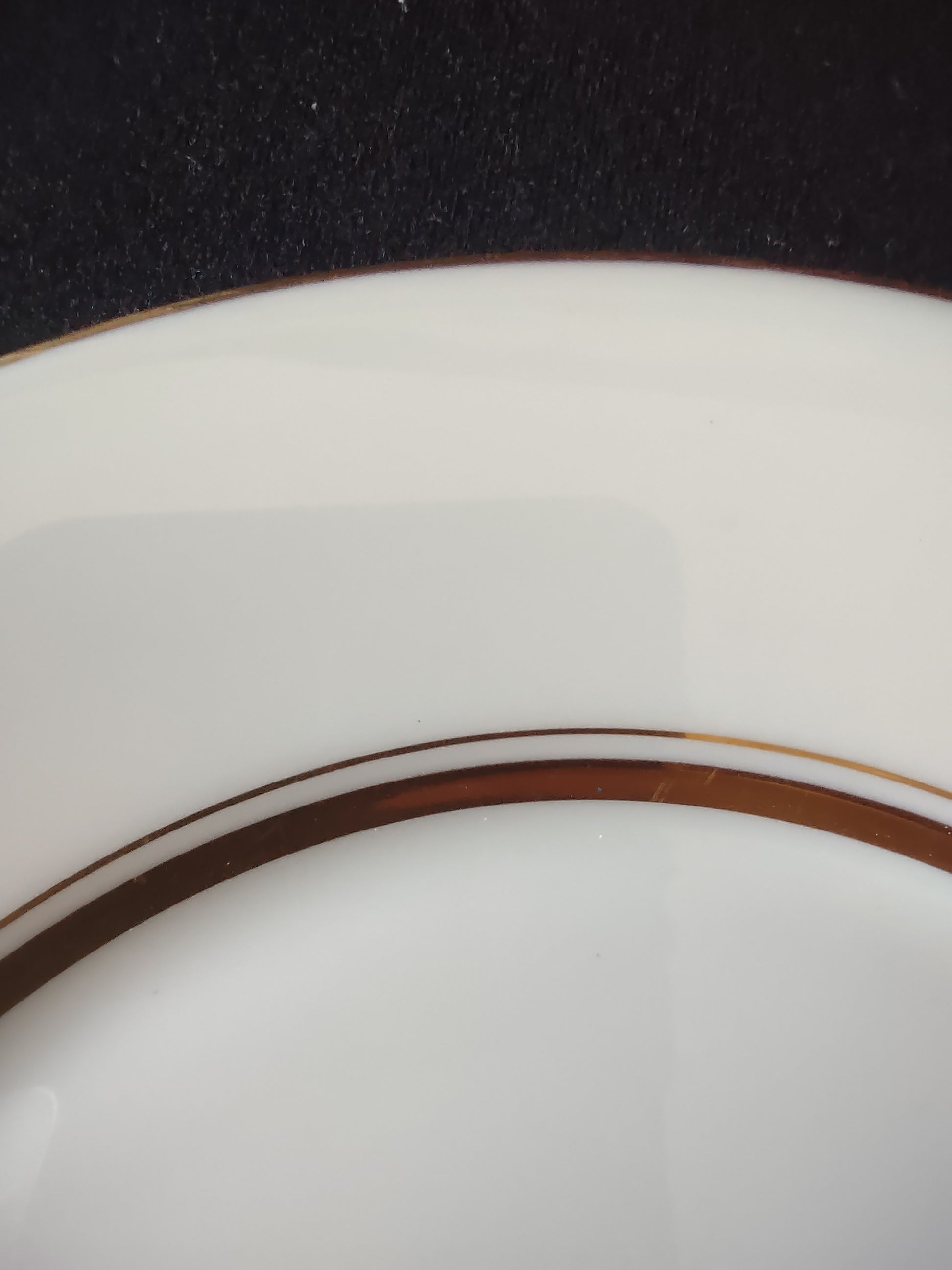 Oxford Andover saucer - close-up showing CHIP on inner rim/well area