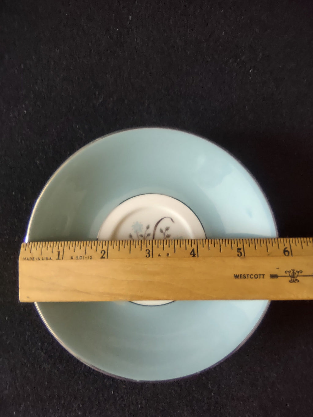 Syracuse China Meadow Breeze saucer showing powder blue field and white center medallion with platinum trim