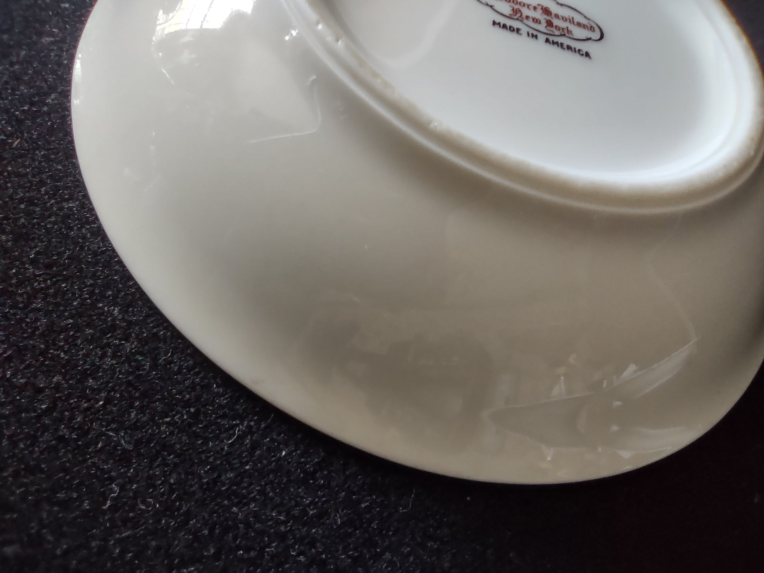 Set of 3 Theodore Haviland New York Art Deco red band saucers on black background