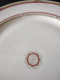 Theodore Haviland New York Made in America backstamp in red script on white porcelain