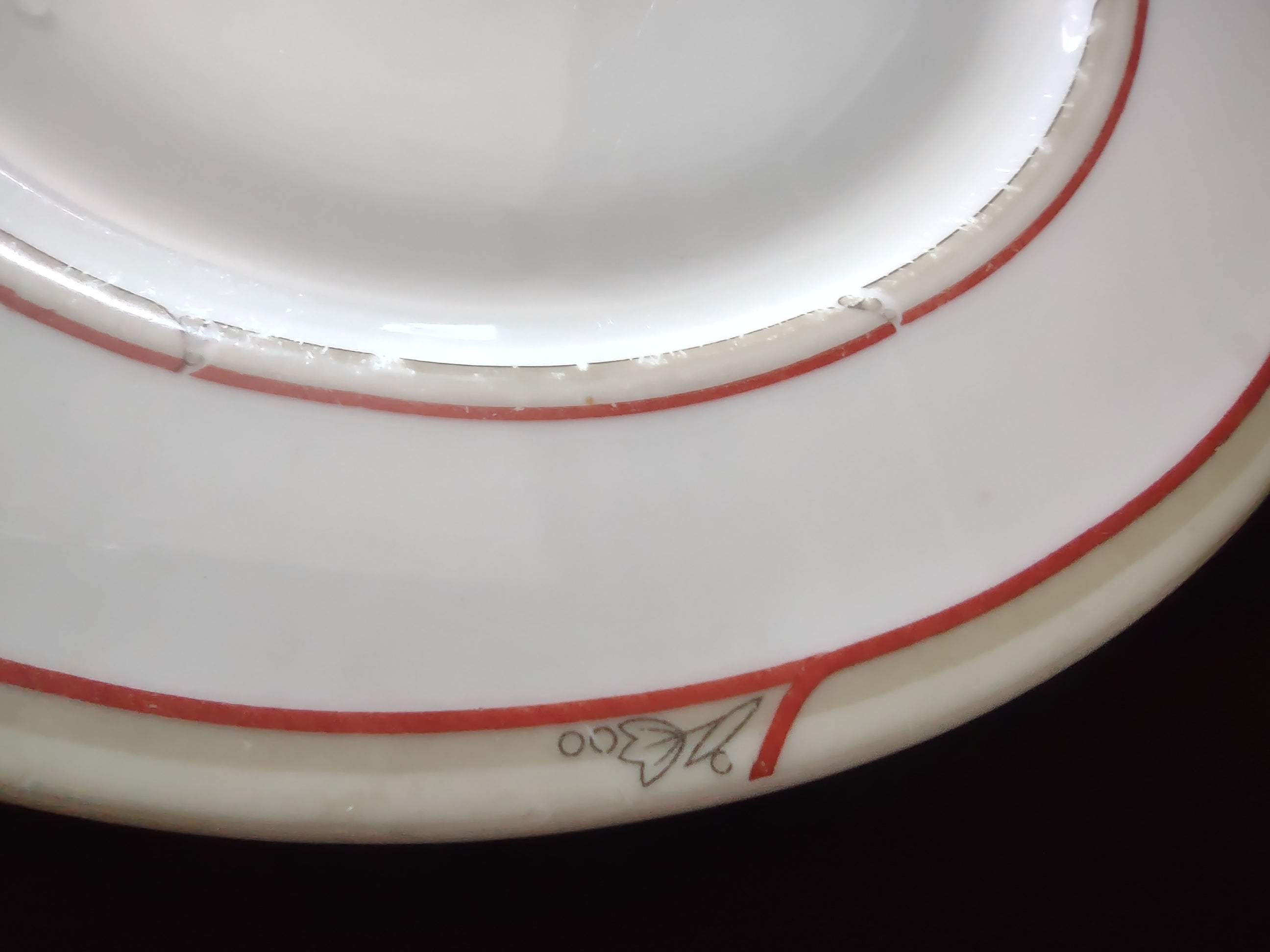 Ruler showing approximately 6-1/2 inch diameter of Theodore Haviland Art Deco plate
