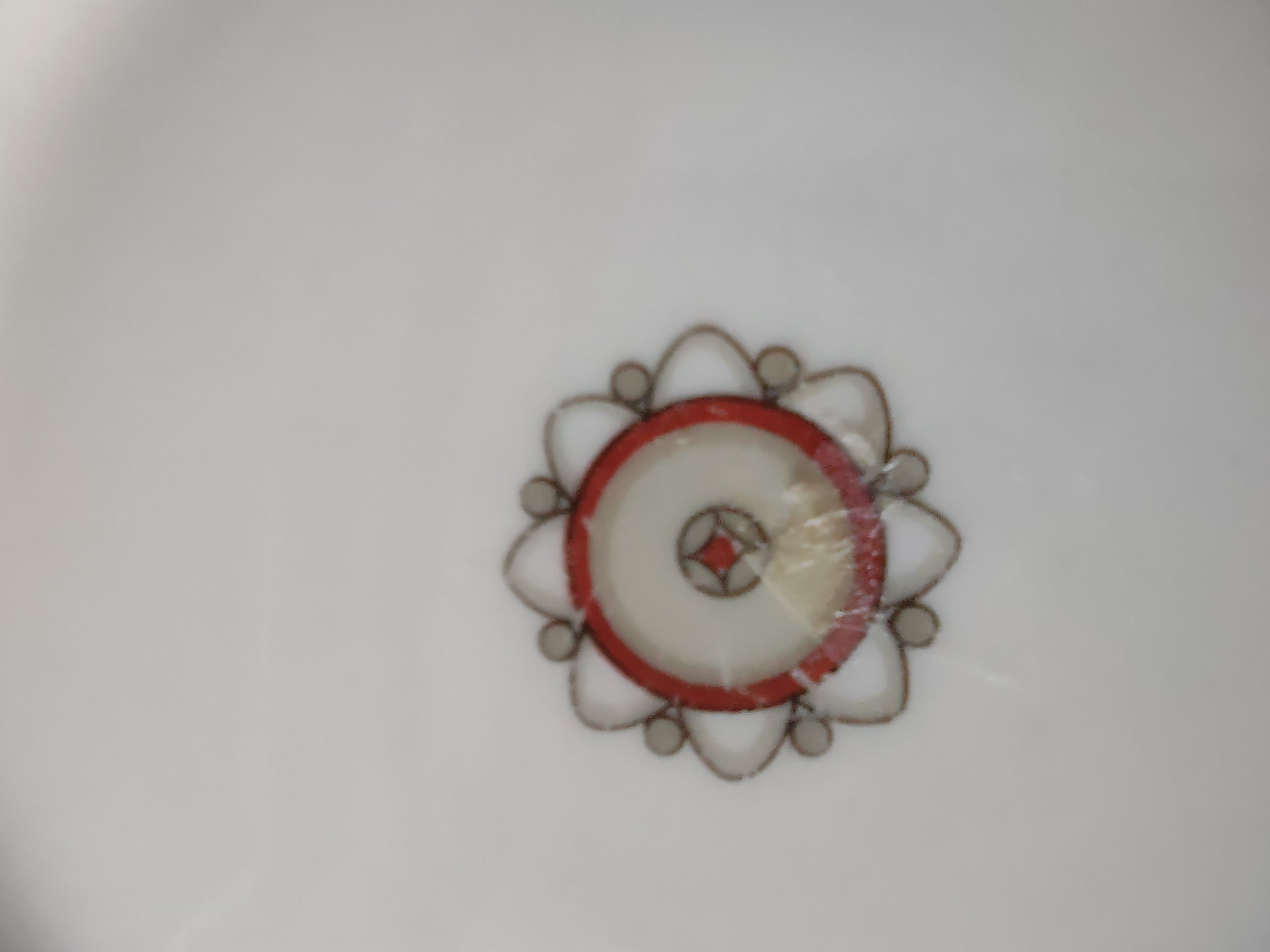 Set of 6 Theodore Haviland New York Art Deco red band plates arranged on black background