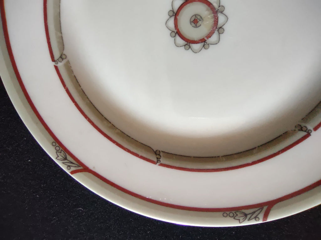 Back of Theodore Haviland New York plate showing backstamp in cloud cartouche and discoloration on underside