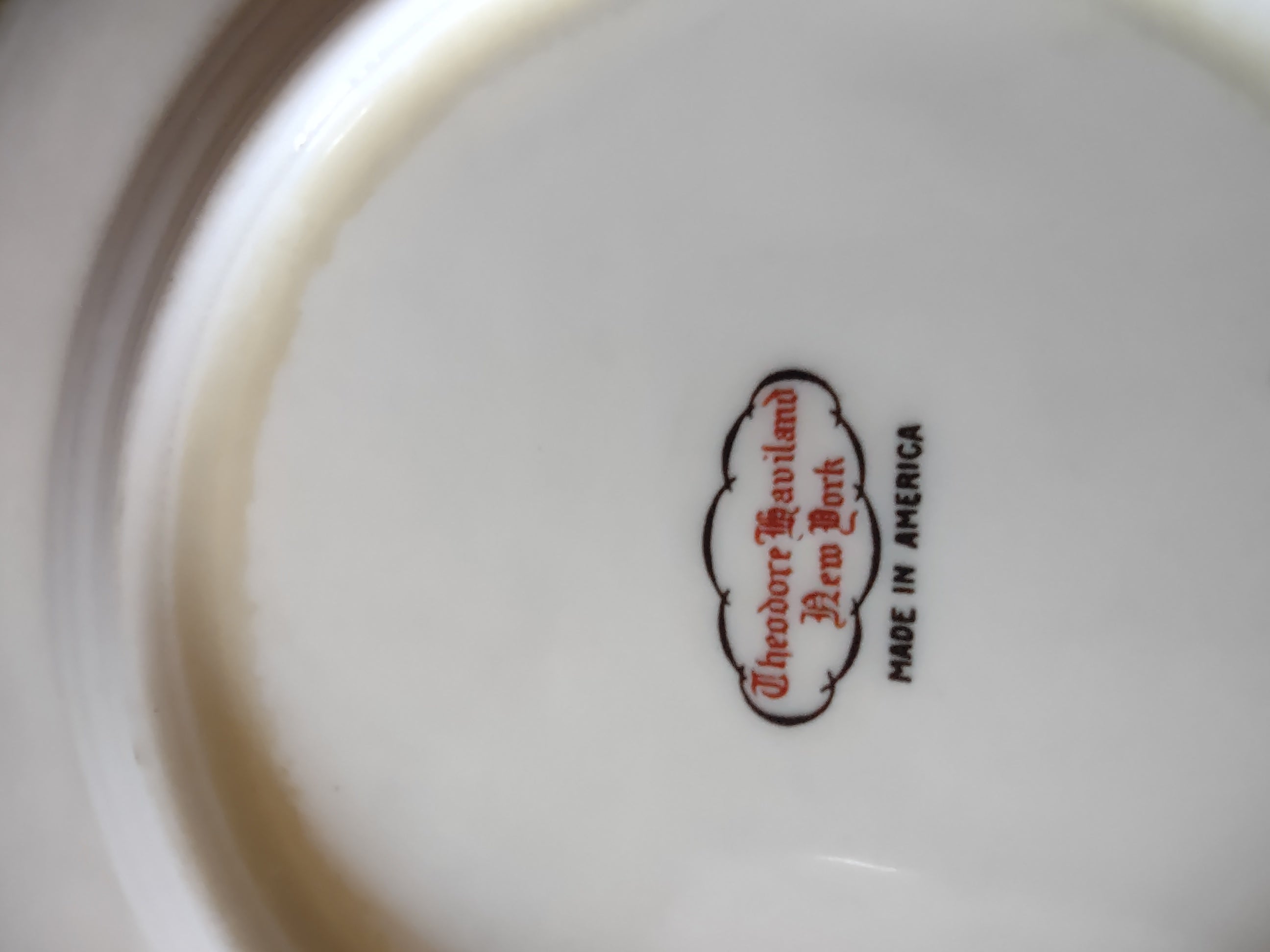 Ruler showing approximately 6-1/2 inch diameter of Theodore Haviland Art Deco plate