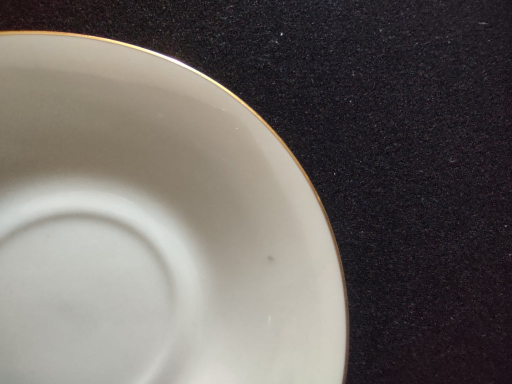 Oxford Bone China Special saucer - front view showing white glaze and gold rim
