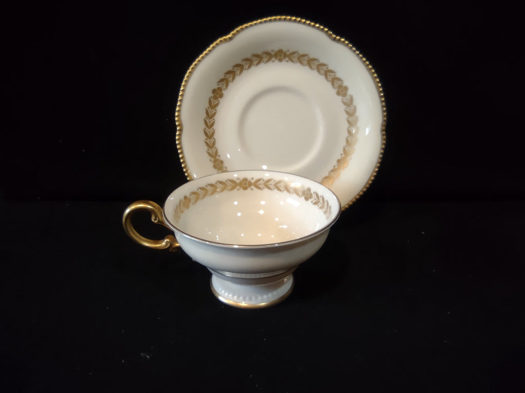 Castleton China Laurel cup bottom showing gold lyre crest mark and gold rim line