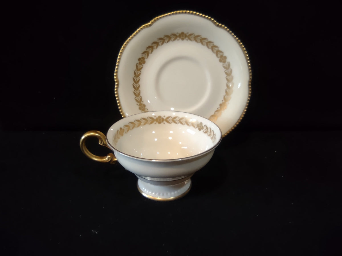 Castleton China Laurel cup bottom showing gold lyre crest mark and gold rim line