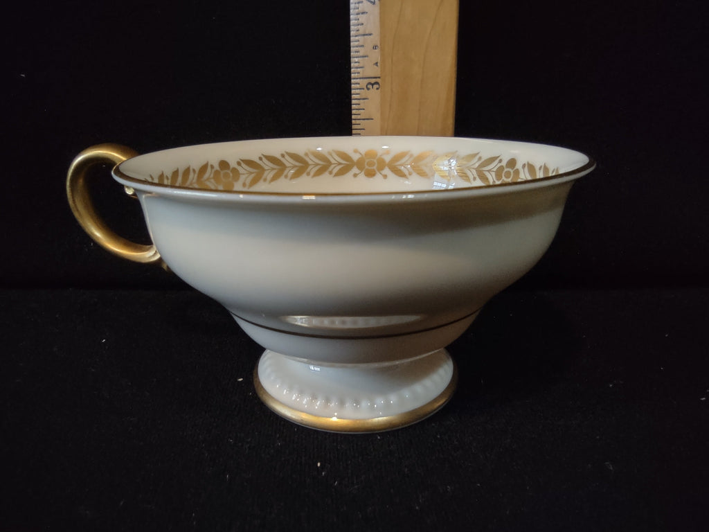 Castleton China Laurel cup and saucer set top view showing gold beaded rim and laurel garland interior