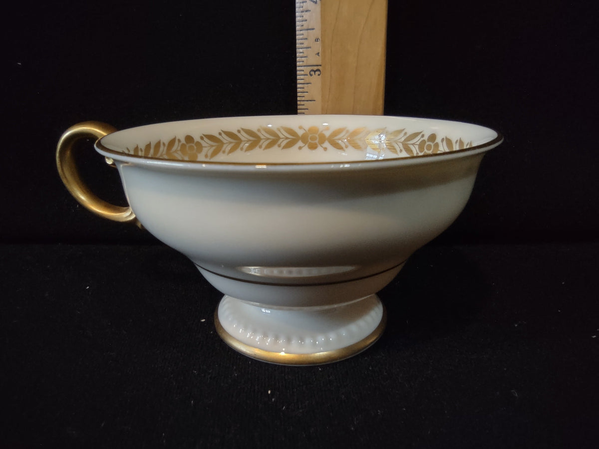 Castleton China Laurel cup and saucer set top view showing gold beaded rim and laurel garland interior