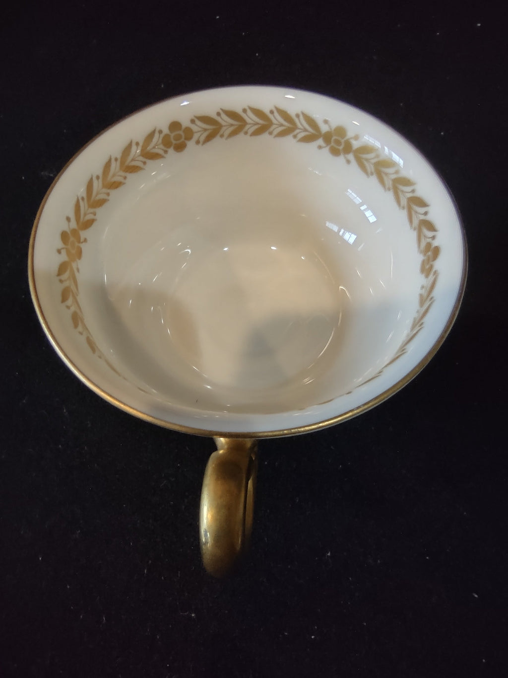 Castleton China Laurel cup interior showing gold laurel garland and age-appropriate discoloration spots