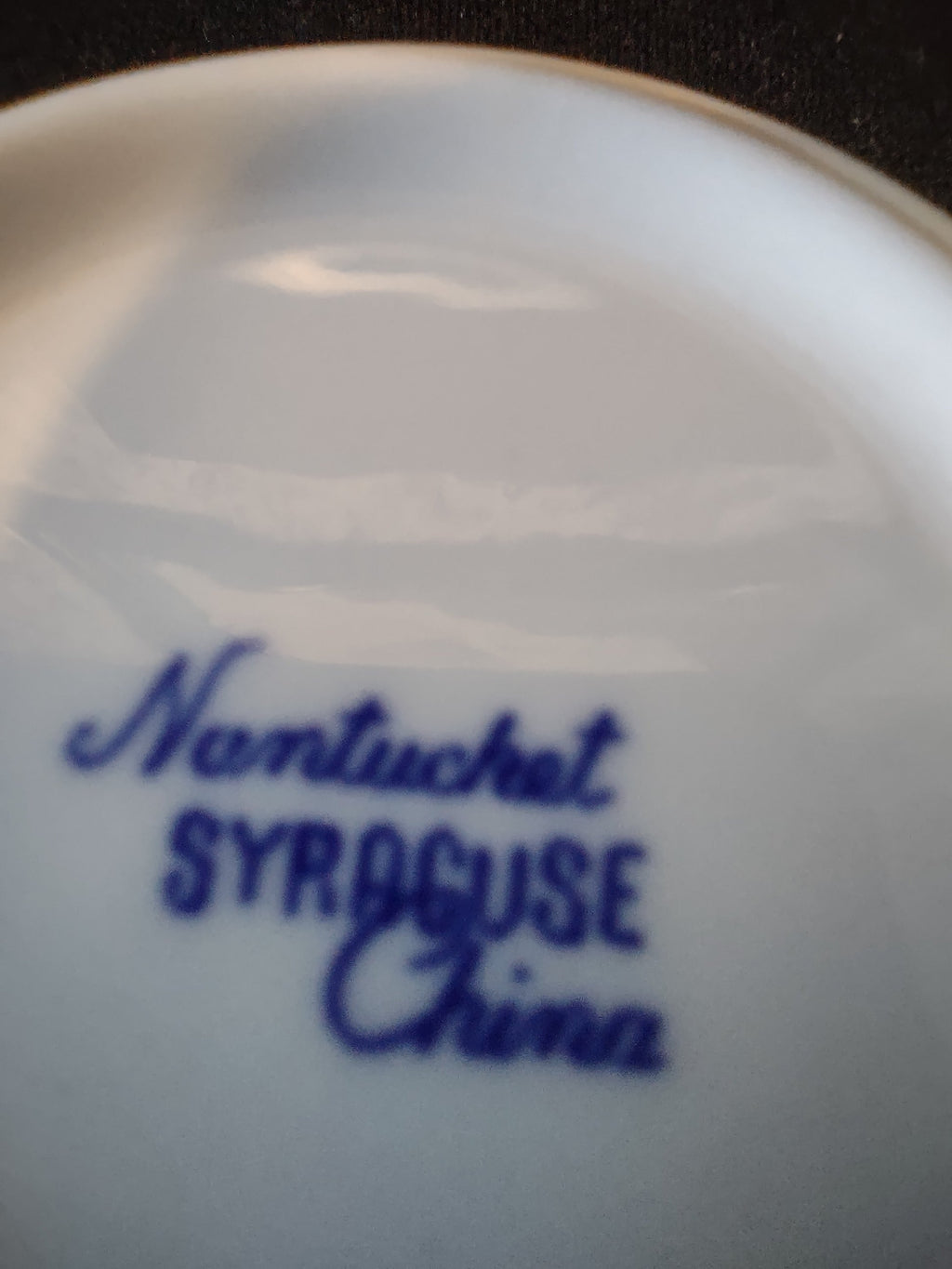 Backstamp showing Nantucket Syracuse China mark in cobalt blue on white porcelain base