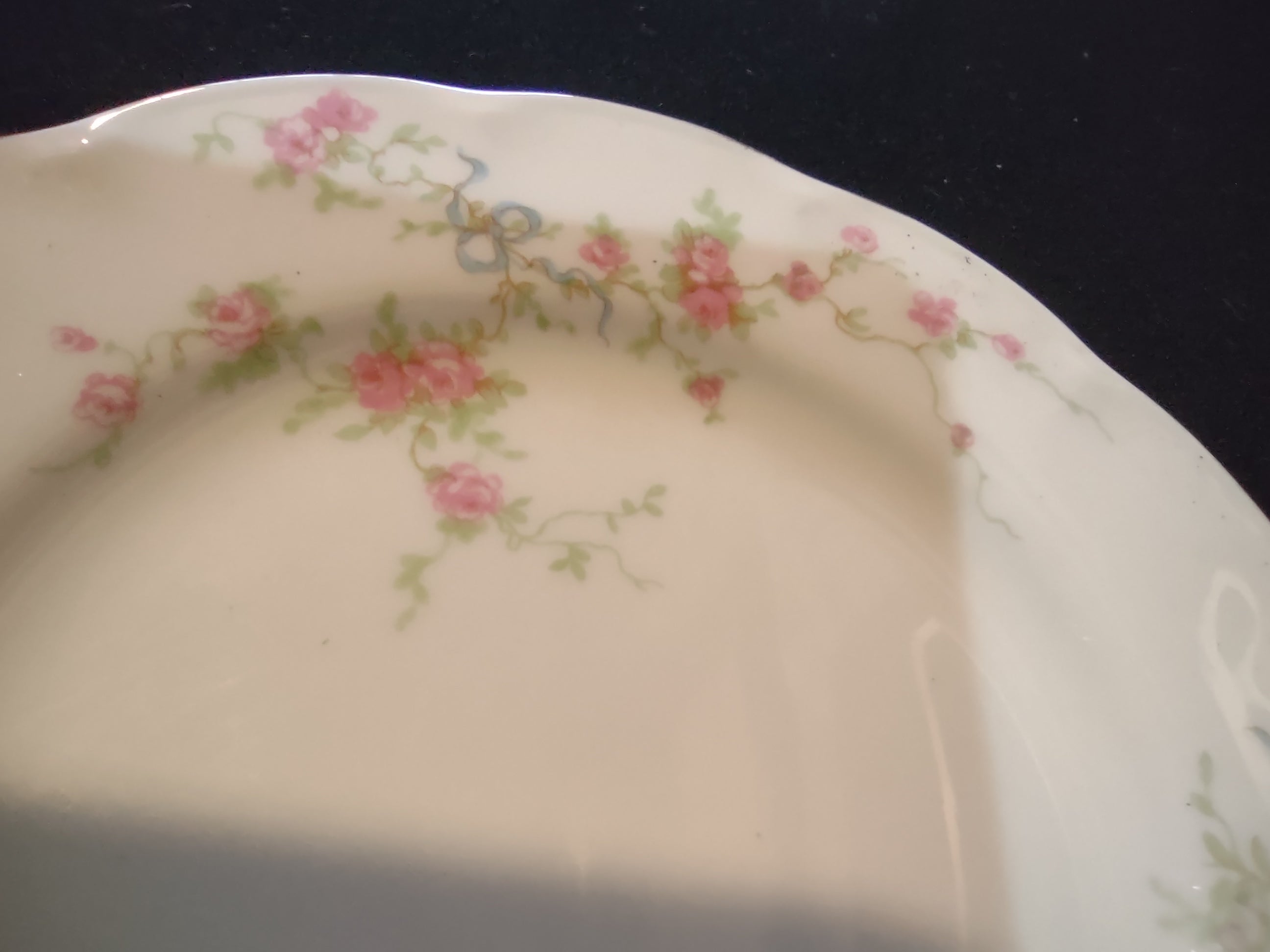 Theodore Haviland NY Rosanne plate - full face view showing scalloped edge and floral pattern