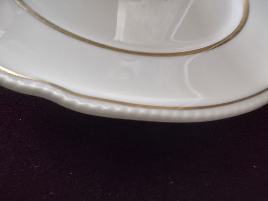 Back of Castleton Dolly Madison plate showing off-white porcelain and foot ring