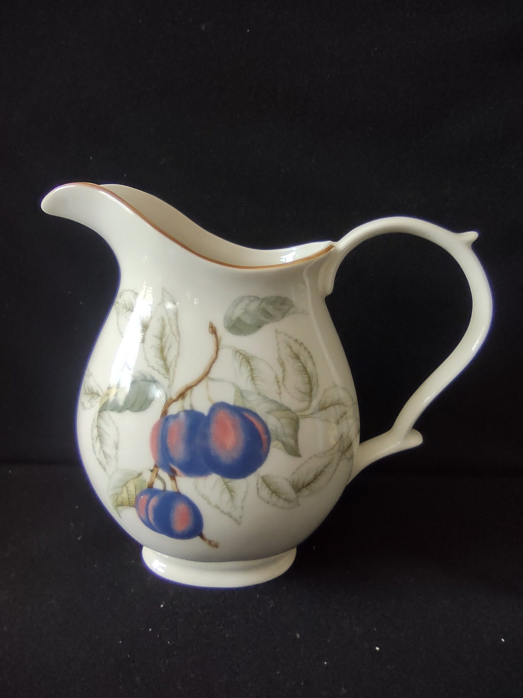 Charter Club pitcher back view showing off-white body and gold trim spout