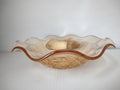 Vintage marigold carnival glass ruffled wave bowl view
