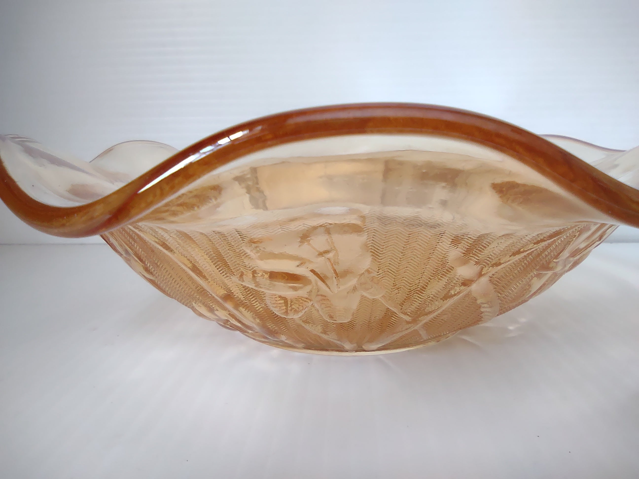 Vintage marigold carnival glass ruffled wave bowl detail